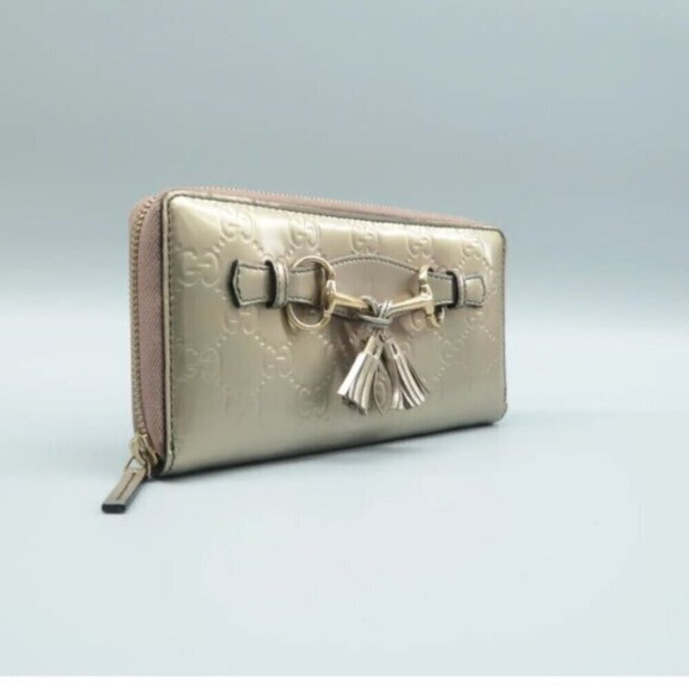Authentic Gucci Champaigne Metallic Gold GG Tassel Zip Around Wallet - Picture 3 of 12